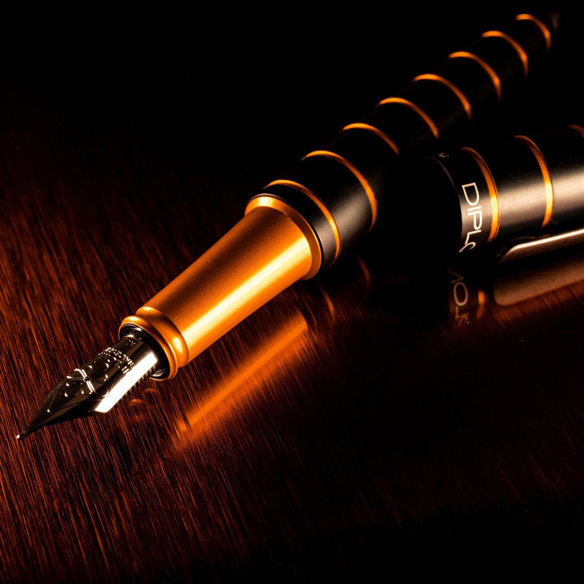 Diplomat Elox Black/Orange 14K Gold Fountain Pen is shaped like the airship named Zeppelin of the 1900's