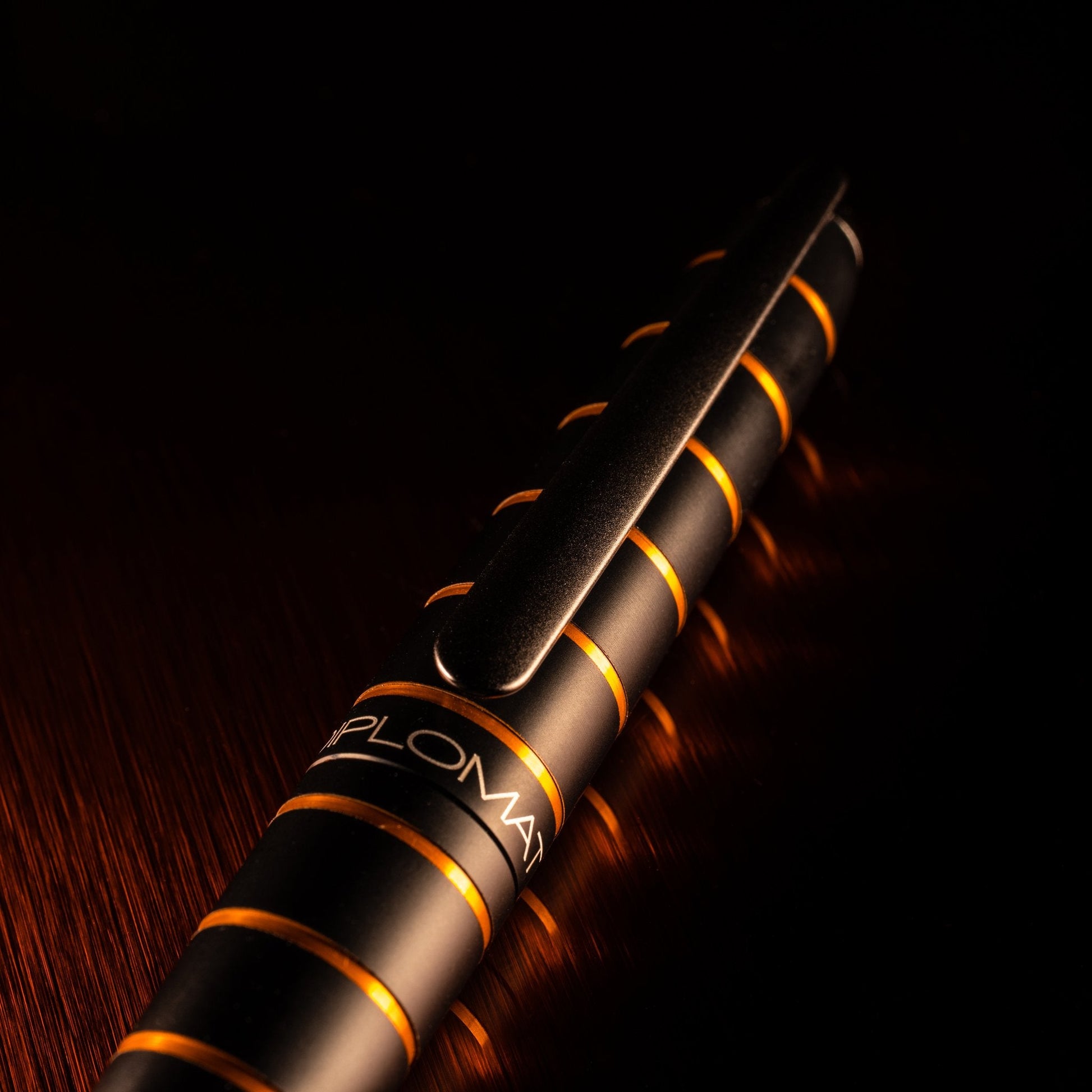 Diplomat Elox Black/Orange 14K Gold Fountain Pen is shaped like the airship named Zeppelin of the 1900's