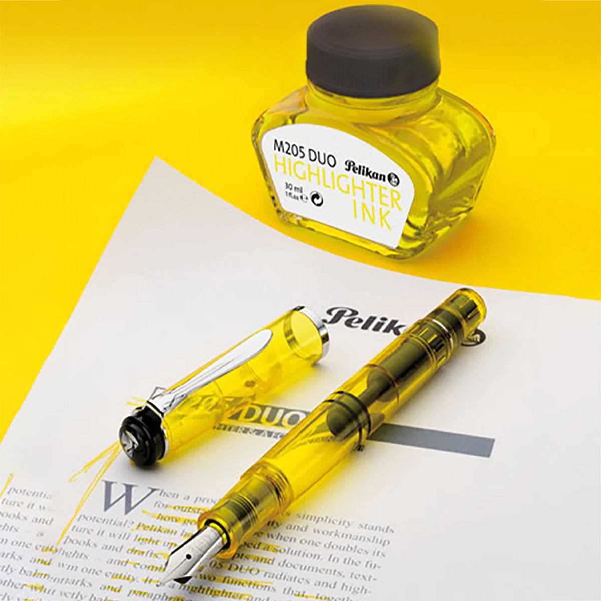 Pelikan Classic M205 Duo Neon Yellow Fountain Pen Set with Double broad nib translucent neon yellow body and neon yellow 30 ml ink bottle. Pen can be used for writing as well as highlighting